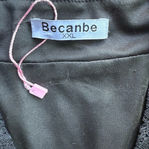 Becanbe Black Lace Long-Sleeve Tunic Top
- Size XXL Solids Minimalist - Picture 3 of 5